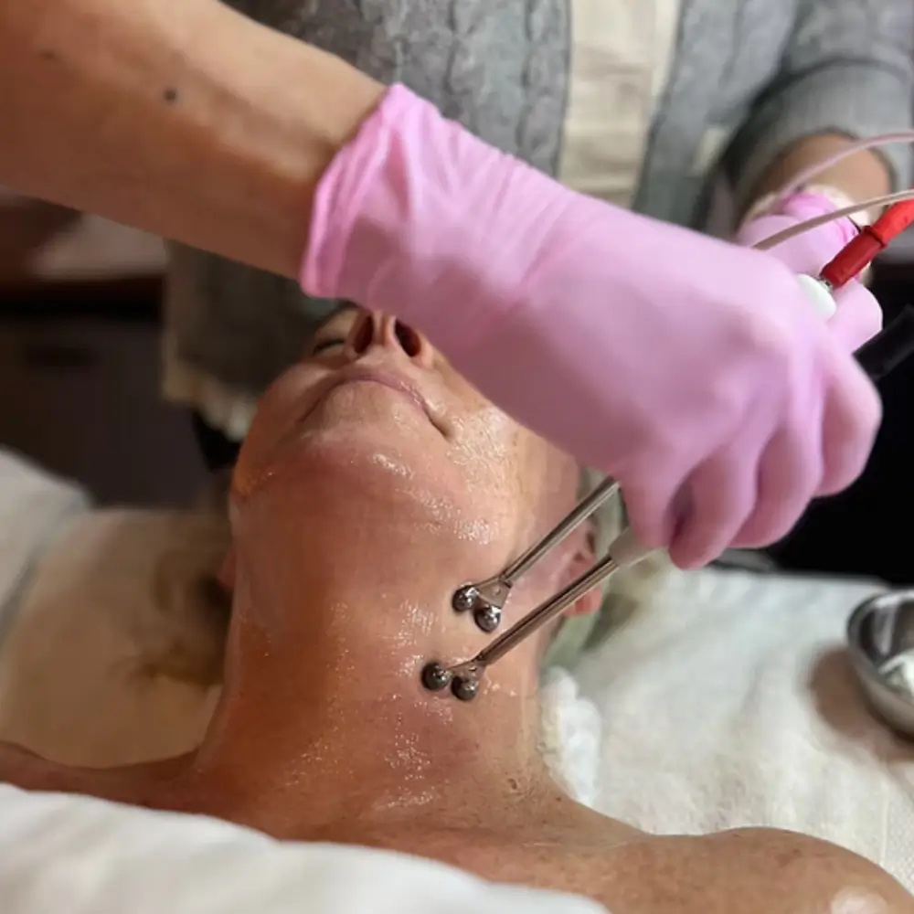 mature beautiful woman getting a microcurrent facial at the skin maven of los gatos from deborah berry