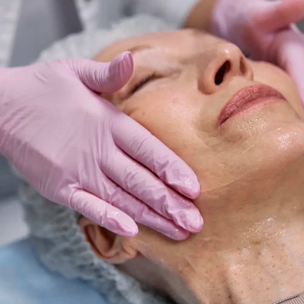 mature beautiful woman getting a firming facial at the skin maven of los gatos from deborah berry