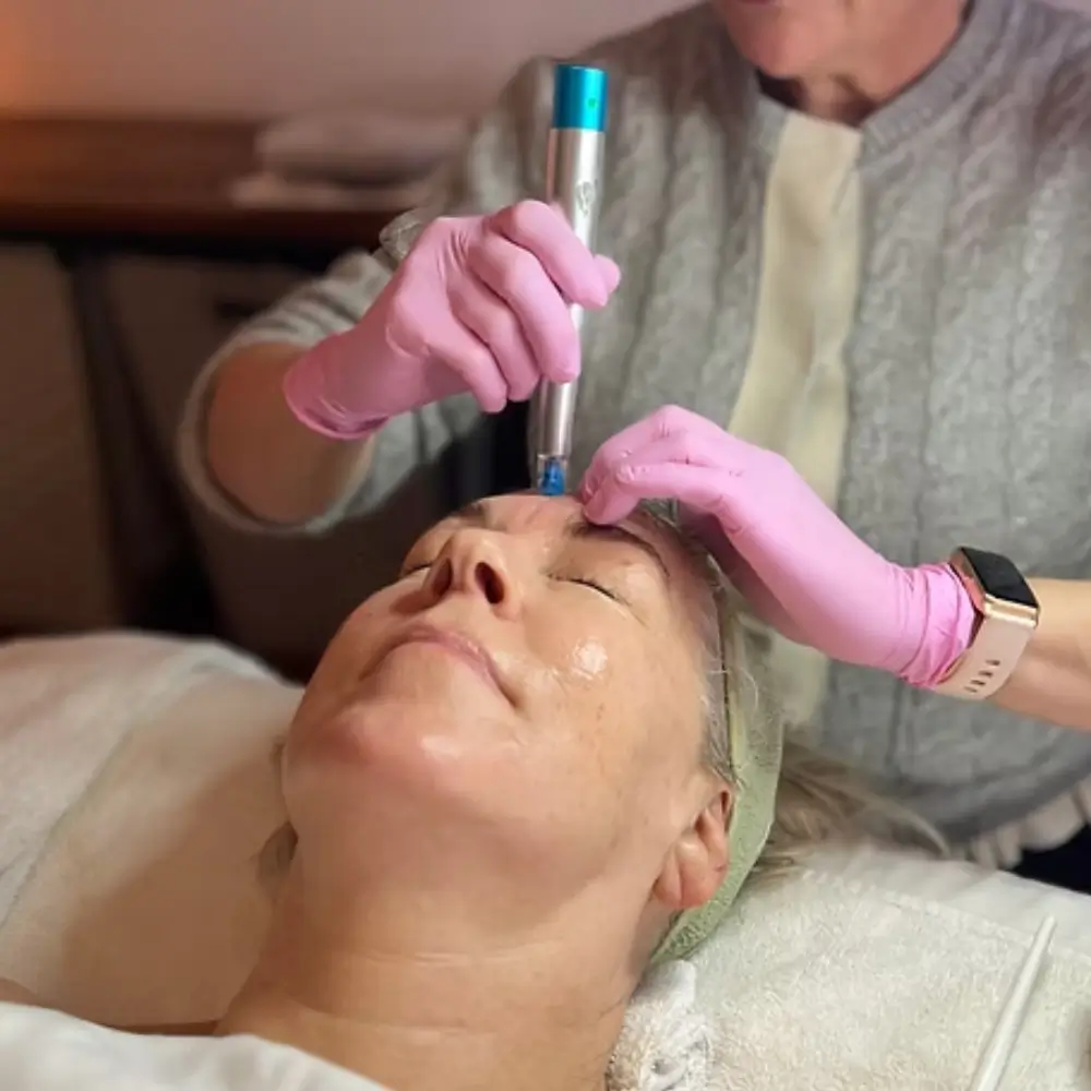 mature beautiful woman getting a rezenerate facial at the skin maven of los gatos from deborah berry