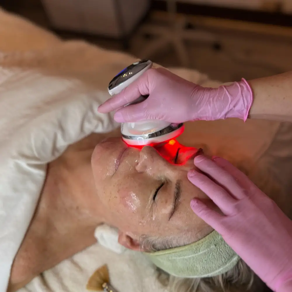 mature woman with mature skin gets the skin maven duo firming facial in los gatos led light therapy